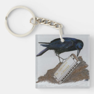 Llavero Crow y Harmonica