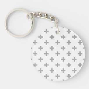 Llavero Cruces de polka gris sobre blanco