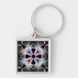 LLAVERO CRUZ ABSTRACTA COLORIDA