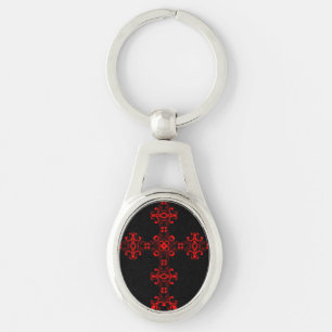 Llavero Cruz con ornamento rojo