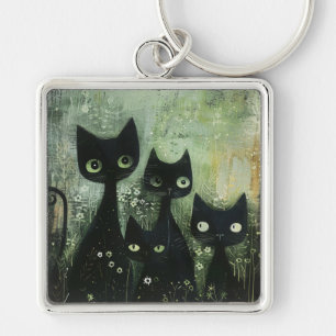 Llavero Cuatro gatos negros con margaritas sobre gris mezc