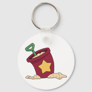 Llavero Cubeta de arena roja con estrella y pala