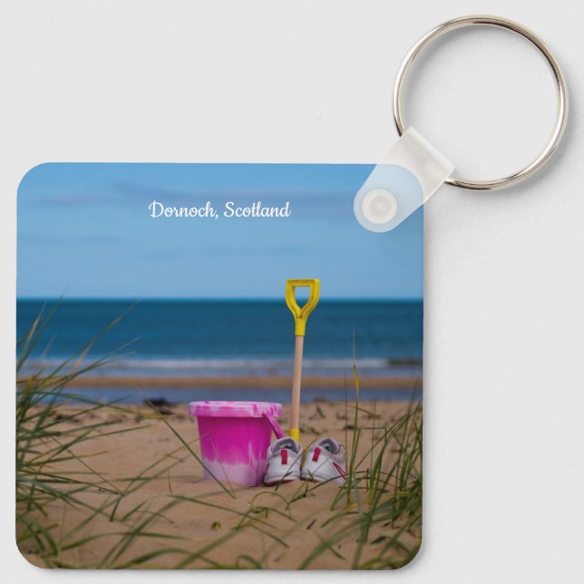 Llavero Cubo y espacio en la playa Dornoch (Reverso )