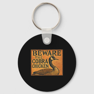 Llavero Cuidado con el pollo cobra, también conocido como