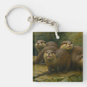 Llavero Curiosa compañía - Otter Family on the Rocks