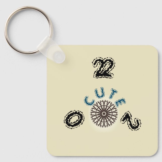 Llavero CUTE_2022_ Aluminio AMARILLO NEGRO Y MARRÓN (Anverso)