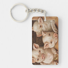 Llavero Cute little piglets in a barn at the farm