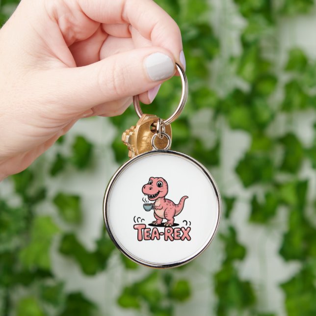 Llavero Cute Tea-Rex Dinosaurio Rosa – ¡Sorber Sucede! (Mano)
