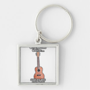 Llavero Dame la guitarra y nadie se lastima.