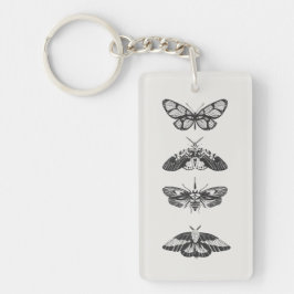 Llavero de acrílico con dibujo de mariposa en blan