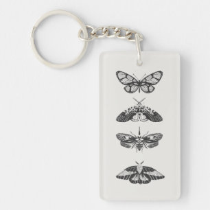 Llavero de acrílico con dibujo de mariposa en blan