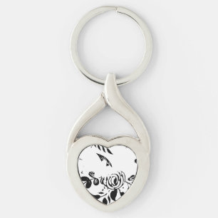 Llavero de corazón floral descolorido en blanco y