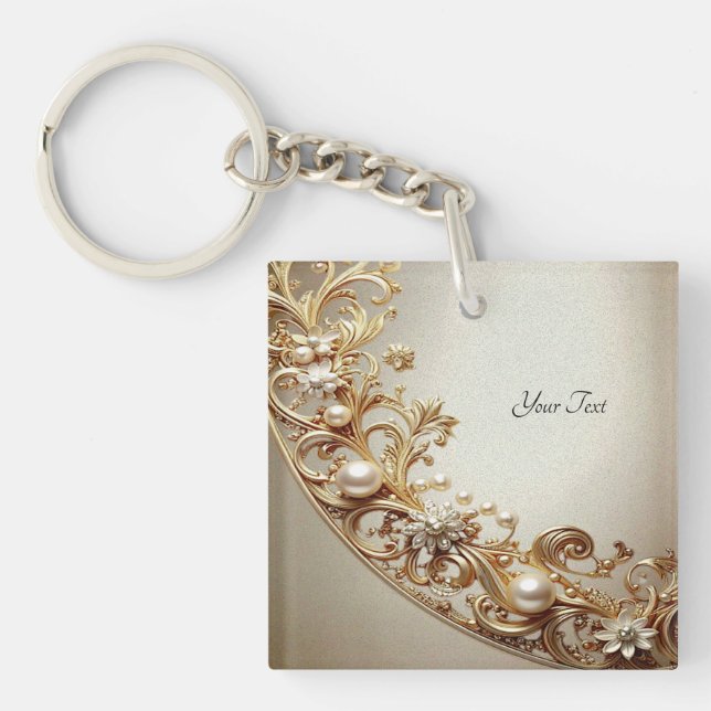 Llavero de oro ornamentado con florituras (Frente)