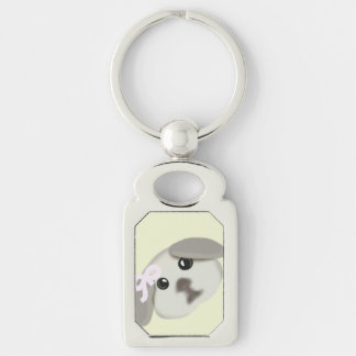 Llavero de plata con arte de cachorro blanco lindo
