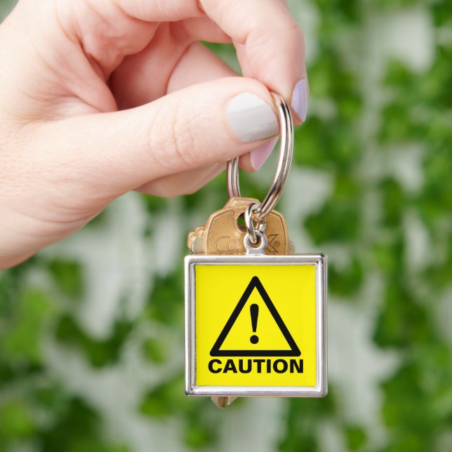 Llavero de señal de precaución amarilla de adverte (Mano)