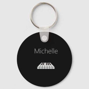 Llavero de teclado de piano y notas musicales