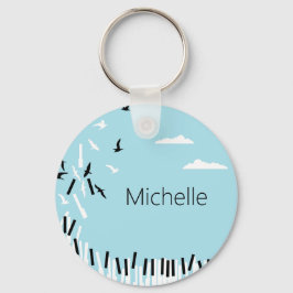 Llavero de teclado de piano y notas musicales