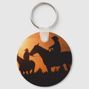 llavero de vaqueros a caballo