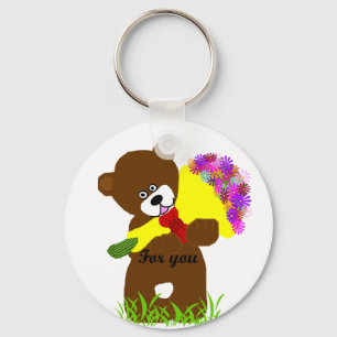 Llavero del oso de la entrega de la flor