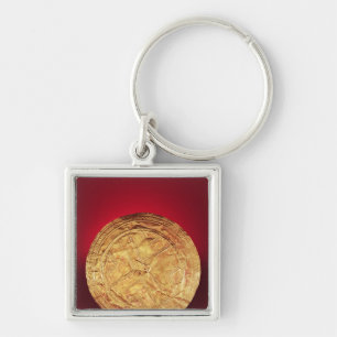 Llavero Disco usado posiblemente como broche, de Tedavnet