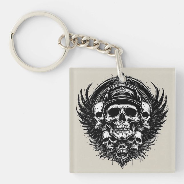 Llavero Diseño de calaveras con alas y símbolos (Frente)