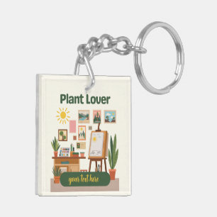 Llavero Diseño de espacio de trabajo creativo y vegetación