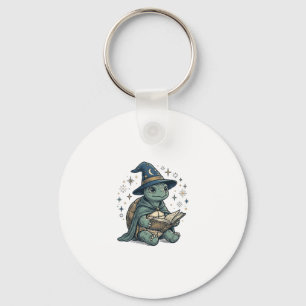 Llavero Diseño de vector de brujo de tortuga linda leyendo