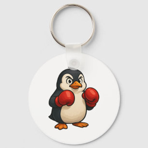 Llavero Diseño deportivo de boxeador de pingüino de dibujo