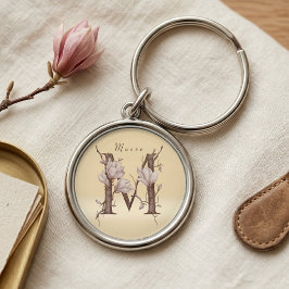 Llavero Diseño floral de magnolia con inicial M elegante d
