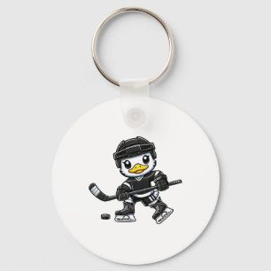 Llavero Diseño lindo de patito Chibi jugando hockey sobre