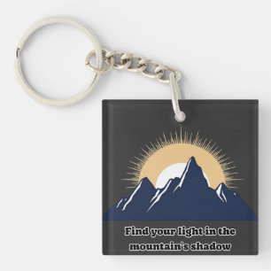 Llavero Diseño minimalista de montaña y explosión de sol