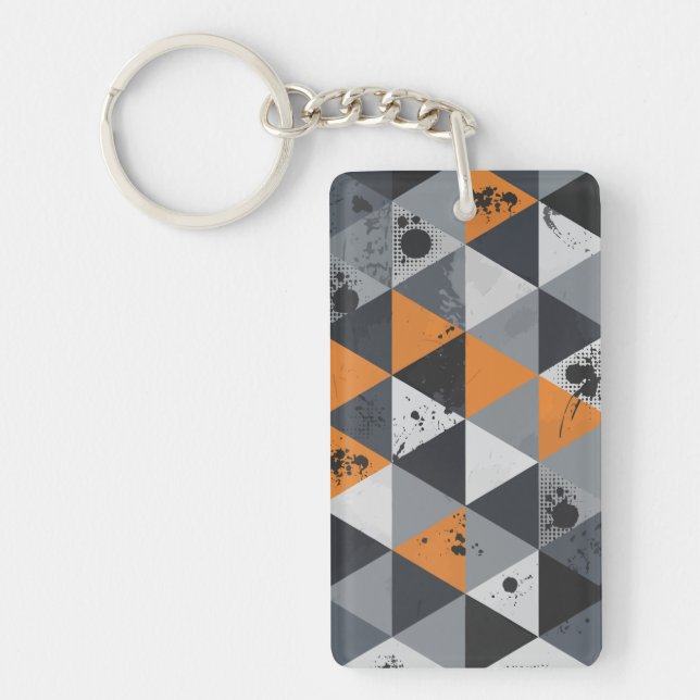 Llavero Diseño Triangular en Naranja, Negro y Gris (Frente)