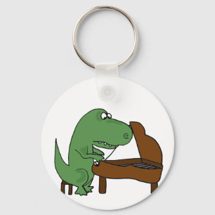 Llavero Divertido Dinosaurio T-Rex jugando al piano