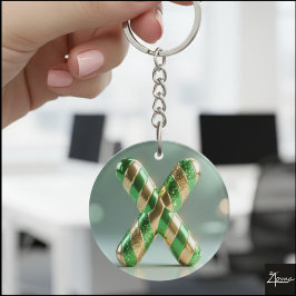 Llavero Doble X de letra brillante verde dorada con brillo