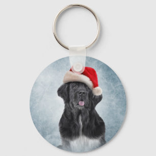 Llavero Dog Newfoundland in red hat of Santa Claus