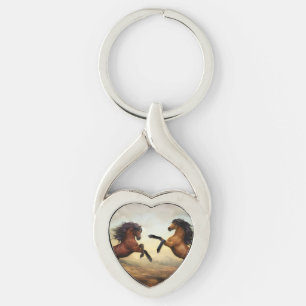 Llavero Dos caballos criando