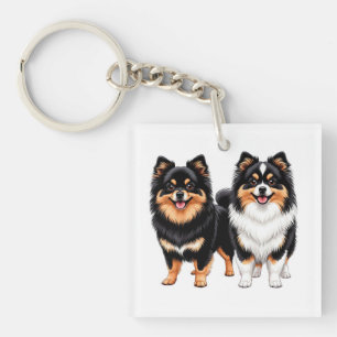 Llavero Dos perros esponjosos felices sentados uno al lado