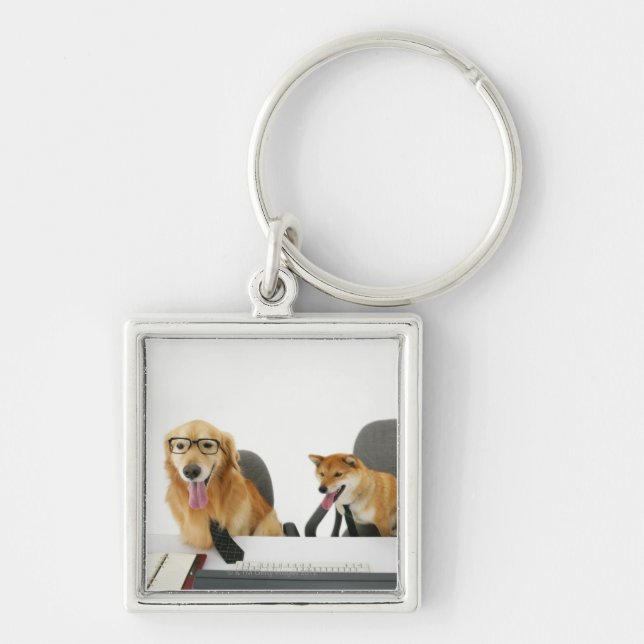 Llavero Dos perros que llevan el lazo y los vidrios, (Frente)