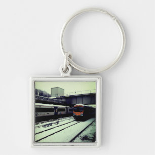 Llavero Dos trenes, en la nieve