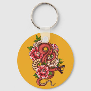 Llavero Dragón floral rosa y negro sobre