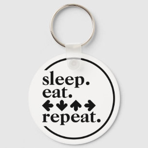 Llavero Duerme. Come. Flechas. Repite.