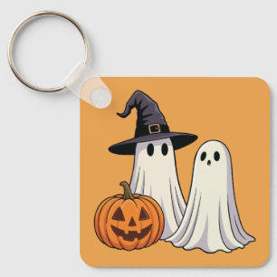 Llavero Dulces fantasmas con sombrero de bruja y calabaza