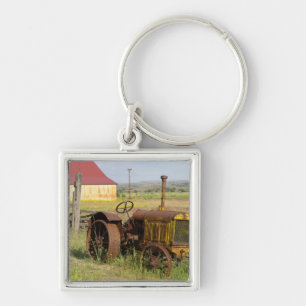Llavero EE. UU., Oregón, Shaniko. Tractor vintage oxidado 