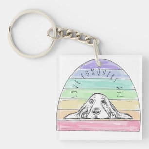 Llavero el amor conquista a todo el perro rainbow basset