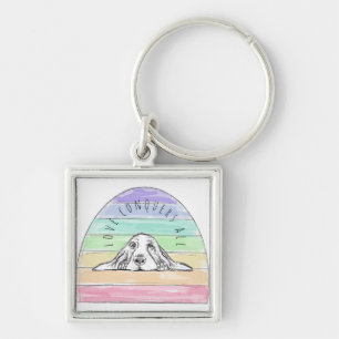 Llavero el amor conquista todo perro arcoíris basset hound