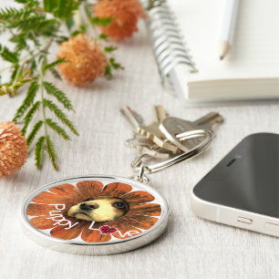 Llavero El amor de los cachorros sale de la flor