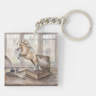 Llavero El caballo erudito saltando de un libro