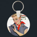 Llavero El Chica que robó aviones<br><div class="desc">Artista:Coby Whitmore | Chica frente al avión con traje de salto azul y bandana roja</div>