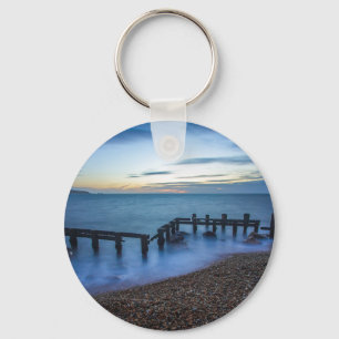 Llavero El cielo estrepitoso sobre la costa y las aguas de