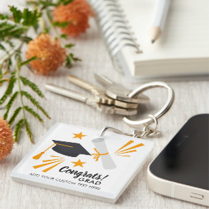 Llavero El diploma del casquillo del graduado de Congrats